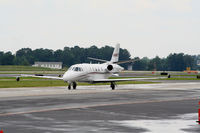 N669TT @ PDK - Taxing to Signature Flight Services - by Michael Martin