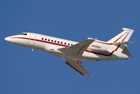 N988H @ LAX - Honeywell International Corporation's 2003 Dassault Falcon 900EX N988H climbing out from RWY 25R. - by Dean Heald