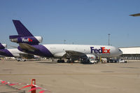 N375FE @ LCK - Parked at FedEx ramp during Gathering of Mustangs and Legends 2007 - by Ken Strohm
