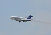 N681CA @ DFW - Champion Air Landing 18R at DFW - One of the few 727's still carrying passengers in the US - by Zane Adams