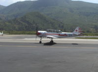 N124YK @ SZP - 1984 Intreprinderea de Avioane Bacau-Romania (Yakovlev) Yak 52 Vedeneev MP-14P 9 cylinder air-cooled radial 360 Hp, taxi back - by Doug Robertson