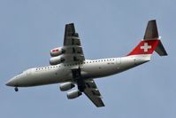 HB-IXU @ LFSB - landing ILS-34 - by runway16