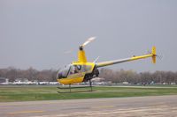 N224BC @ KDPA - Taking off outside the Pilot Shop - by William Hamrick