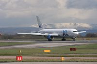 G-VKNI @ EGCC - Taken at Manchester Airport on a typical showery April day - by Steve Staunton