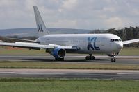 G-VKNI @ EGCC - Taken at Manchester Airport on a typical showery April day - by Steve Staunton