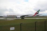 A6-EBV @ EGCC - Taken at Manchester Airport on a typical showery April day - by Steve Staunton
