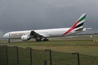 A6-EBV @ EGCC - Taken at Manchester Airport on a typical showery April day - by Steve Staunton