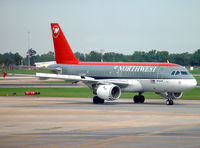N338NB @ KMSY - Northwest - by Christian Waser