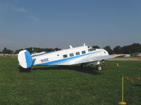 N18E @ OSH - 1958 Beech SUPER E18S, two P&W R-985 Wasp Jrs. 450 Hp each, first of the Super 18s, higher cabin headroom, gross 9,300 lbs, airstair door, wngspan increase, new wing tips, 4 cabin windows per side, etc. - by Doug Robertson