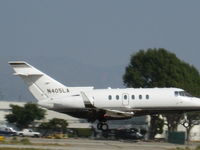 N405LA @ KVNY - Landing RWY 16R - by Chris Allegro