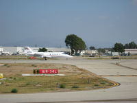 N723CC @ KVNY - Landing RWY 16R from KBJC - by Chris Allegro