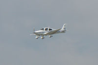 N987AA @ GKY - At Arlington Municipal - shot through the heat. - by Zane Adams