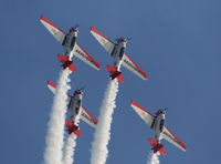 N991GM @ SUA - Aeroshell T-6 team - by Florida Metal