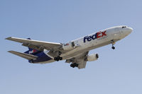 N375FE @ KLAX - Landing 24R at LAX - by Todd Royer