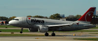 N318NB @ KMSP - Landing Runway 22 at MSP - by Todd Royer