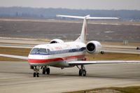 N627AE @ CID - Taxiing on Alpha 4 to the terminal - by Glenn E. Chatfield