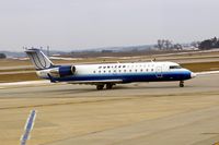 N75987 @ CID - Taxiing by the tower on the way to runway 13 - by Glenn E. Chatfield