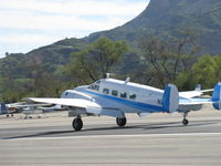 N18E @ SZP - 1958 Beech E18S, two P&W R-985s 450 Hp each, old friend first photographed at EAA AirVenture 2008, landing roll Rwy 04 - by Doug Robertson