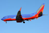 N244WN @ LAX - Southwest Airlines N244WN (FLT SWA1669) from Tucson Int'l (KTUS) on short final to RWY 24R. - by Dean Heald
