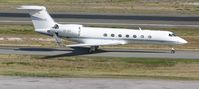 OE-IRG @ TNCM - taxing runway 10 - by daniel jef