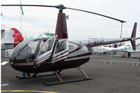 G-WEAT @ EGTB - Robinson R44 exhibited at 2009 AeroExpo at Wycombe Air Park - by Terry Fletcher