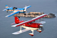 N226SU - SU-26M and Pitts S2C Over San Francisco - by Ben Hochman