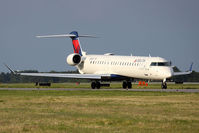N134EV @ ORF - Brand new Bombardier CRJ-900ER N134EV operated by Atlantic Southeast Airlines for Delta Connection taxiing to RWY 5 for departure to Hartsfield-Jackson Atlanta Int'l (KATL) as Flight ASQ5051. - by Dean Heald
