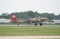 N93012 @ KDPA - Boeing B-17G, NL93012, landing RWY 20R KDPA, note the flame on number 4 - by Mark Kalfas