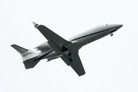 N24SR @ KDPA - Sears Roebuck Learjet 60, right downwind for 20R KDPA after a trip from KAVL - by Mark Kalfas