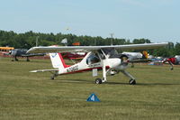 N7080D @ KOSH - PZL-104 - by Mark Pasqualino