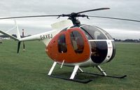 G-AXEJ @ EGTC - This Hughes 369HS was at the 1977 Cranfield Business & Light Aviation Show. - by Peter Nicholson