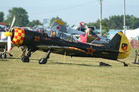 N122FS @ KOSH - YAK-52TW - by Mark Pasqualino
