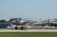 N4477 @ KOSH - Beech D18S - by Mark Pasqualino