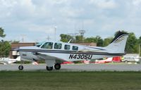 N4305U @ KOSH - Beech A36 - by Mark Pasqualino