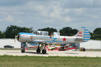 N2207X @ KOSH - YAK 52 - by Mark Pasqualino