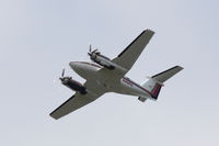 N49PH @ CYVR - Beech F90 heading southeast, taken from south runway at CYVR. - by Torben Hansen
