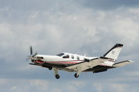 N850SJ @ KOSH - Socata TBM 850 - by Mark Pasqualino