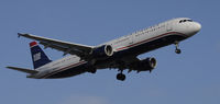 N169UW @ KLAX - Landing 24R at LAX - by Todd Royer