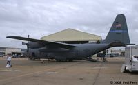 62-1844 @ NTU - Stoic looking C-130E on a darkened ramp - by Paul Perry