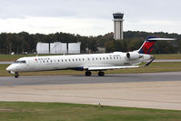 N228PQ @ ORF - Delta Connection (Pinnacle Airlines) N228PQ (FLT FLG873) taxiing to RWY 23 for departure to Hartsfield-Jackson Atlanta Int'l (KATL). This aircraft was delivered 04-09-2009. - by Dean Heald