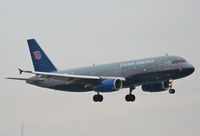 N405UA @ KORD - United Airlines A320-232, UAL736 arriving from KDFW on 27L. - by Mark Kalfas