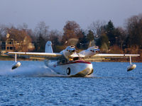 N70AL @ 51MI - Taxiing across the lake - by Isaac Adler