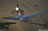 AK875 @ IAD - Smart looking P-40 in the building - by Paul Perry