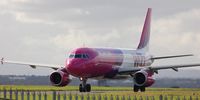 HA-LPE @ EGGP - Moving to threshold at LPL John Lennon - by jetjockey