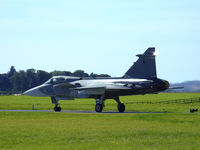 9240 @ EGQL - JAS-39C Gripen from 211tl,taxiing to the runway for it's display at Leuchars airshow '09 - by Mike stanners