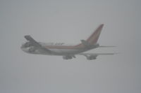 N704CK @ KLAX - Kalitta Air Boeing 747-209F, blasting through the fog, 25L departure KLAX. - by Mark Kalfas