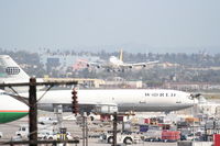 DQ-FJK @ KLAX - Air Pacific Boeing 747-412, short final 25L KLAX. - by Mark Kalfas