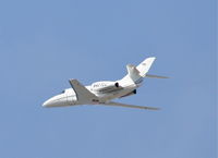 N427CJ @ KLAX - EFTEN CORP FALCON 10, 25L departure KLAX. - by Mark Kalfas