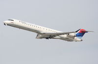 N804SK @ KLAX - SkyWest Bombardier CL-600-2C10,  N804SK, SKW4457 departing 25R KLAX for KSLC. - by Mark Kalfas