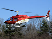 N63MB @ N14 - Leaving the FlyingW - by JOE OSCIAK